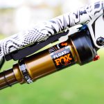 Fox Float SL Factory 2024 - Custom gloss white and orange graphics with black background