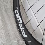 FFWD Tyro Disc 2020 - Matte custom light grey graphics with carbon grey background